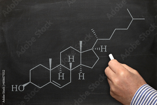 Cholesterol structural chemical formula, Hand drawing with a chalk on a blackboard, School chemistry class