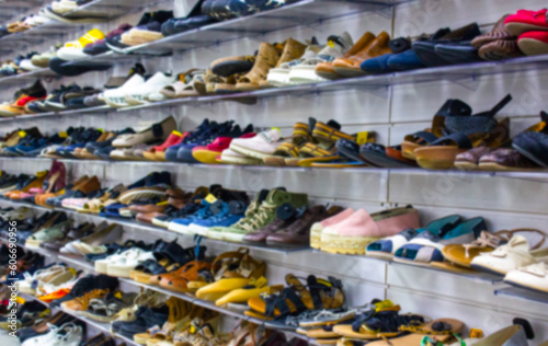 Blurred background with a shoe counter.Shoes in a blur shop,background.