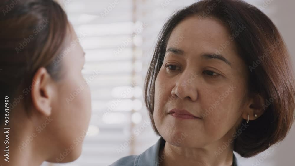 Middle aged asia people old mom love care trust comfort help young teen talk crying stress relief at home. Mum as friend listen adult child woman feel pain sad worry of broken heart life crisis issues Middle aged asia people old mom love care trust comfort help young teen talk crying stress relief at home. Mum as friend listen adult child woman feel pain sad worry of broken heart life crisis issues