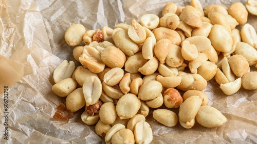 Savory Temptation: Close-Up of Roasted and Salted Peanuts, Showcasing Irresistible Crunchiness in Stunning 4K Ultra HD Resolution