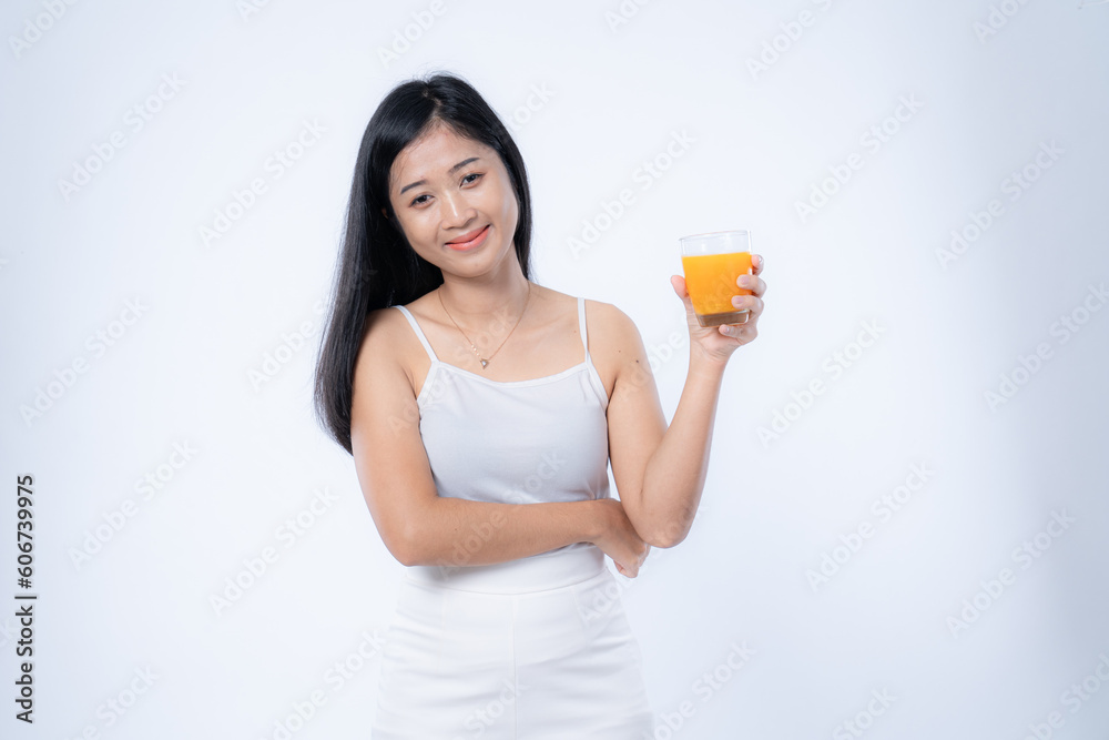 woman with a glass of orange juice, isolated on white woman with a glass of orange juice, isolated on white