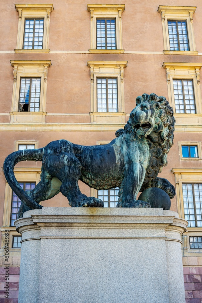 Vertical shot of the dirty Lion Statue at the royal palace in the Gamla Stan area of Stockholm