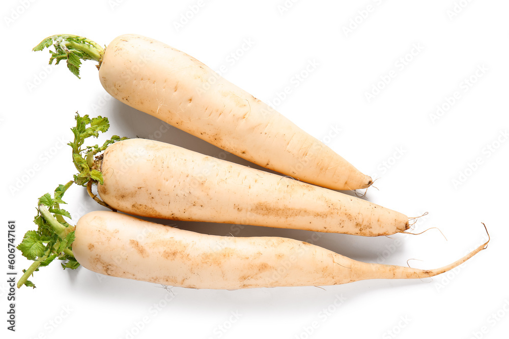 Fresh daikon radishes on white background Fresh daikon radishes on white background