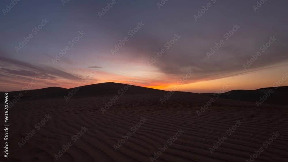 Time lapse of sky clouds sunset sunrise over the sand dune desert Time lapse of sky clouds sunset sunrise over the sand dune desert
