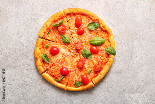 Tasty pizza margarita on grey background