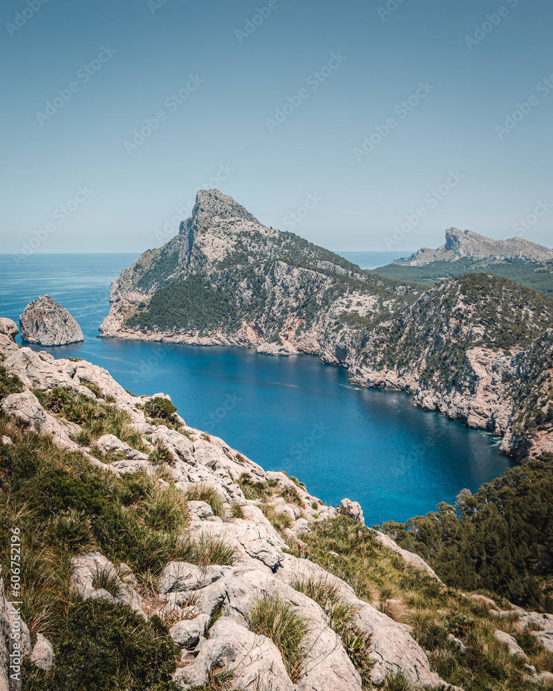 Beautiful view of a sea with cliffs under the clear sky Beautiful view of a sea with cliffs under the clear sky