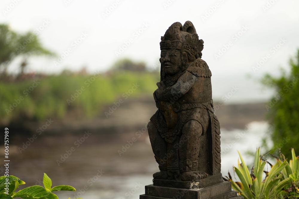 Fototapeta premium Historic statue near Tanah Lot Temple in Bali, Canggu, Indonesia