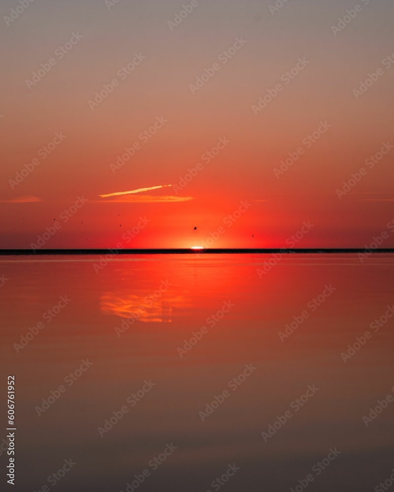 Mesmerizing seascape with sunset in a red sky