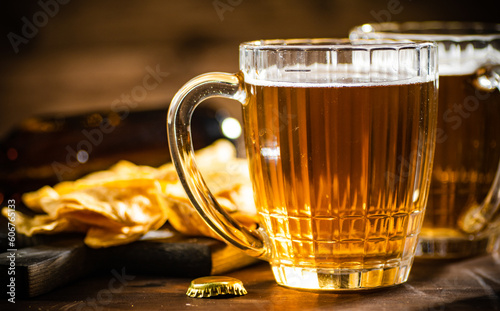 Fresh beer with corn chips.