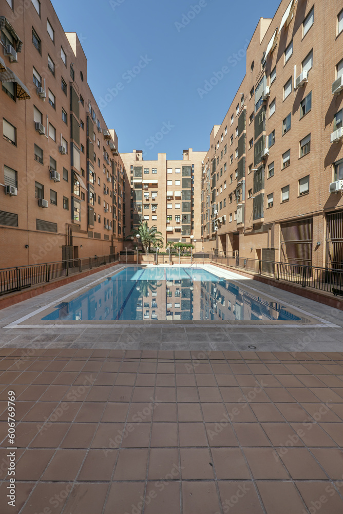 Shared Communal Pool Pool of a community of neighbors in the common areas Stock Photo ...