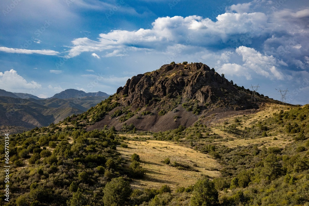Beautiful shot of mountain landscapes under a cloudy sky Beautiful shot of mountain landscapes under a cloudy sky