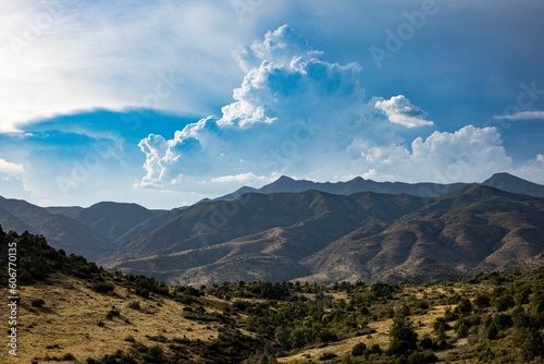 Beautiful shot of mountain landscapes under a cloudy sky