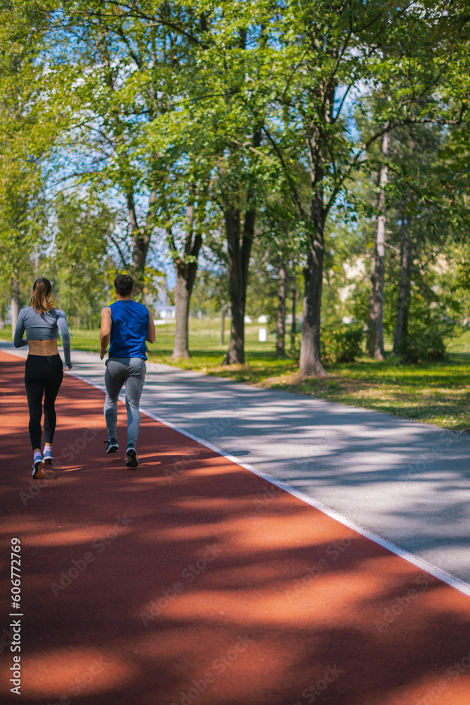 Fototapeta premium Two adults running