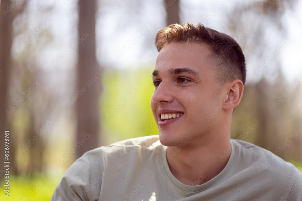 Portrait of a confident and successful young man outside in park Portrait of a confident and successful young man outside in park