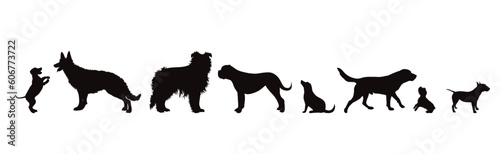 Set of vector silhouette of different dogs on white background.