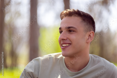 Portrait of a confident and successful young man outside in park