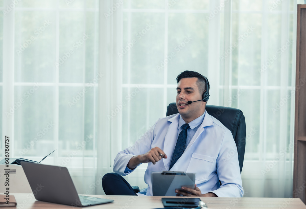 Physician conducts online, distant consultations via video call. Taking medical histories, dealing with patient's concerns, answering queries. Creating a treatment plan and prescribing medications. Physician conducts online, distant consultations via video call. Taking medical histories, dealing with patient's concerns, answering queries. Creating a treatment plan and prescribing medications.