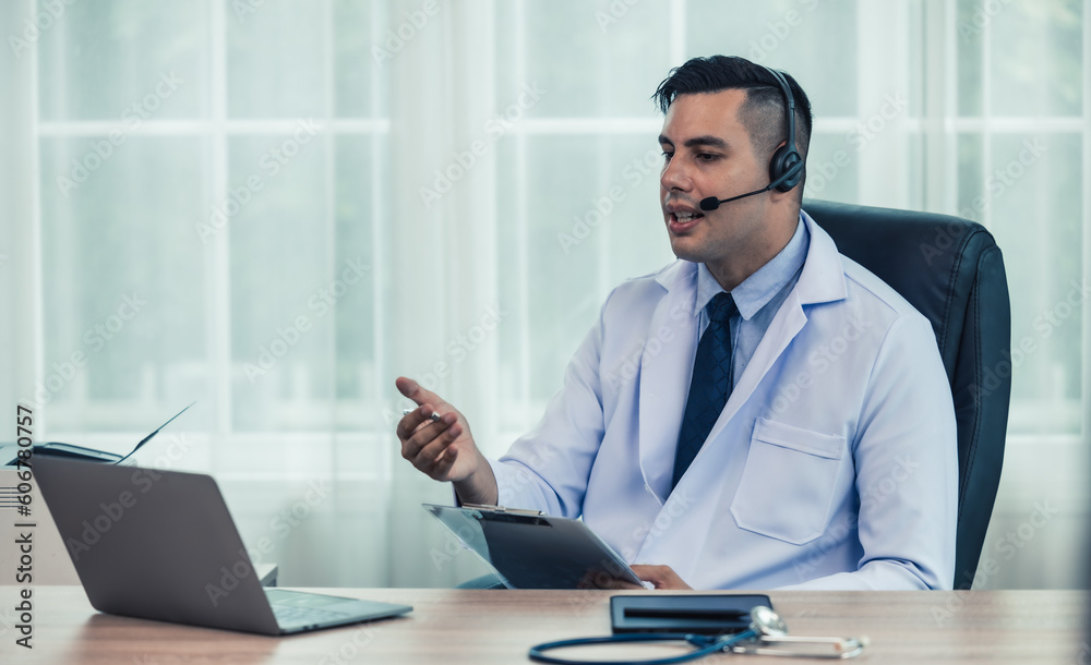 Physician conducts online, distant consultations via video call. Taking medical histories, dealing with patient's concerns, answering queries. Creating a treatment plan and prescribing medications. Physician conducts online, distant consultations via video call. Taking medical histories, dealing with patient's concerns, answering queries. Creating a treatment plan and prescribing medications.