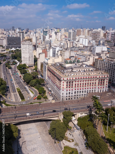 Beautiful aerial drone view of Anhangabau Valley square, viaduto do cha and classic buildings of Sao Paulo city skyline in summer sunny day. Concept of architecture, urban, metropolis. photo