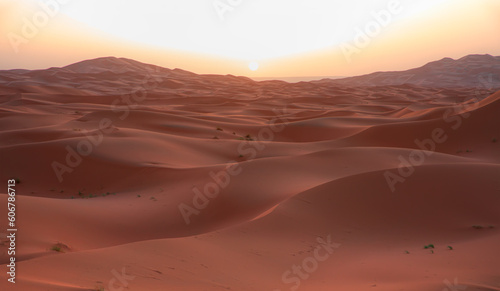 Sand dunes in the Sahara Desert at amazing sunrise  Merzouga  Morocco - Orange dunes in the desert of Morocco - Sahara desert  Morocco
