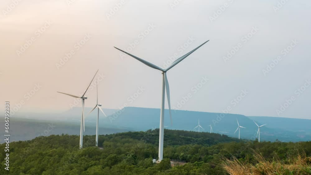Time lapse of wind turbine for generating electricity from wind power with beautiful sky and clouds Time lapse of wind turbine for generating electricity from wind power with beautiful sky and clouds