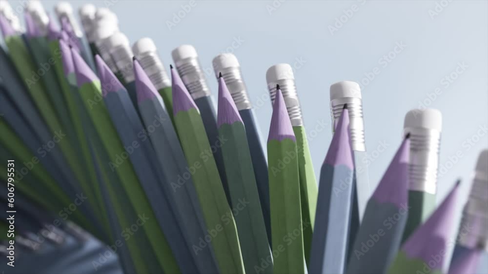 Abstract concept. Colored pencils are in a row. Conveyor movement. Office stationery is organized. Eraser on a pencil Abstract concept. Colored pencils are in a row. Conveyor movement. Office stationery is organized. Eraser on a pencil