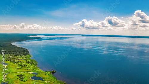Dnipro river and green meadows aerial view from above, Dnieper river spring landscape, Ukraine 