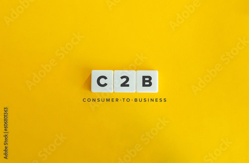 C2B (Consumer to Business) Banner. Block Letter Tiles on Yellow Background. Minimal Aesthetics.