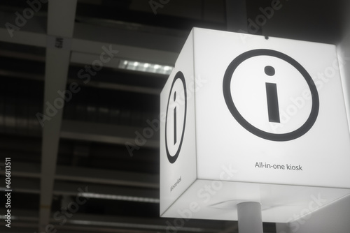 One stop service and information kiosk counter lighting sign at the department store or airport terminal. Sign and symbol object photo.
