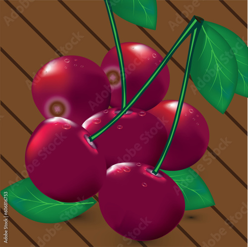 ripe cherries on a wooden surface