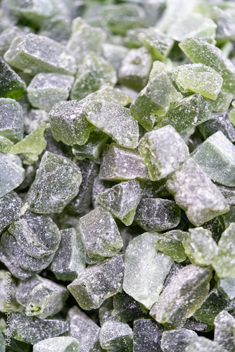 close up of marshmallows with sugar of green color