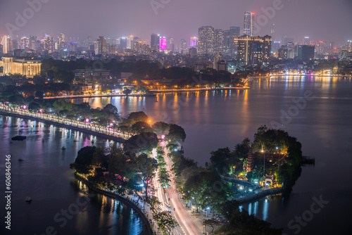 Aerial view of Hanoi skyline cityscape near Thanh Nien street and Tran Quoc pagoda at night. Famous destination of Vietnam