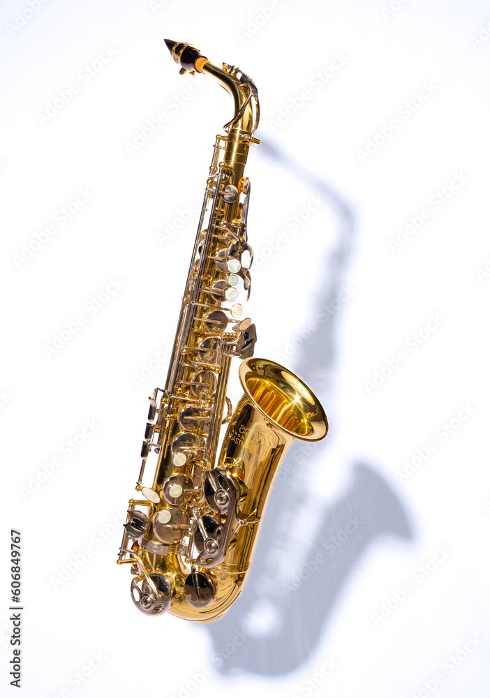 Obraz premium saxophone on white against shadow