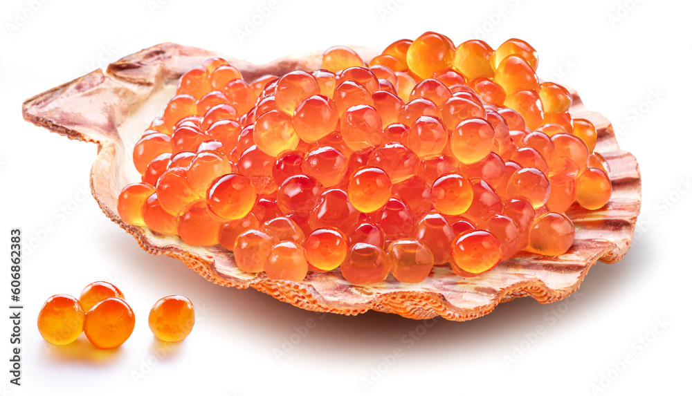 Αυτοκόλλητο Red caviar or salmon roe in scallop shell isolated on white background