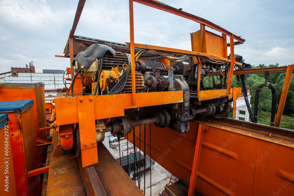 Overhead crane motors and speed reducer closeup photo Overhead crane motors and speed reducer closeup photo