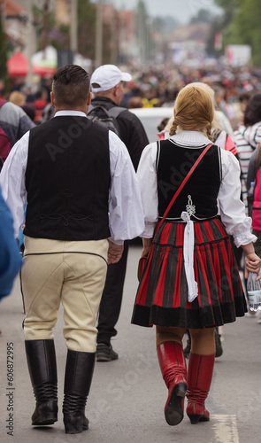 Csiksomlyo, Romania: couple in traditional sekler popular costume 
