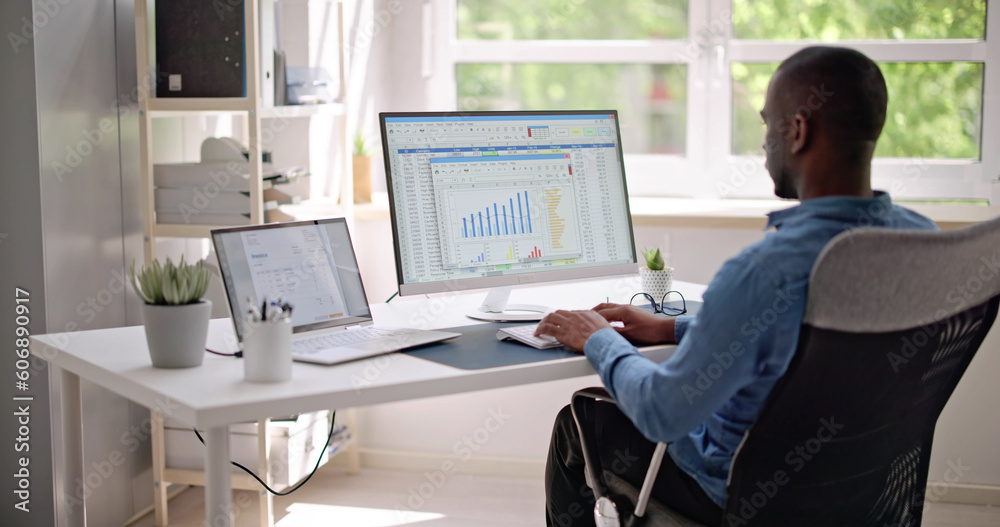 Data Analyst African Man Using Spreadsheet Data Analyst African Man Using Spreadsheet