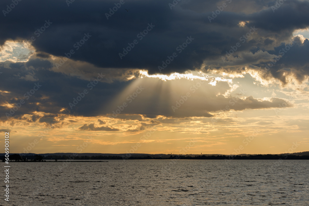Evening landscape, sunrise or sunset on the lake or the sea Evening landscape, sunrise or sunset on the lake or the sea