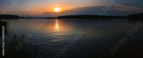 Evening landscape  sunrise or sunset on the lake or the sea