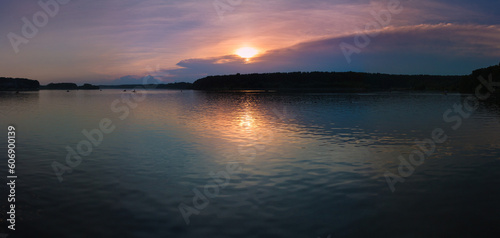 Evening landscape  sunrise or sunset on the lake or the sea
