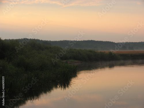 Evening landscape, sunrise or sunset on the lake or the sea © Kozlik_mozlik