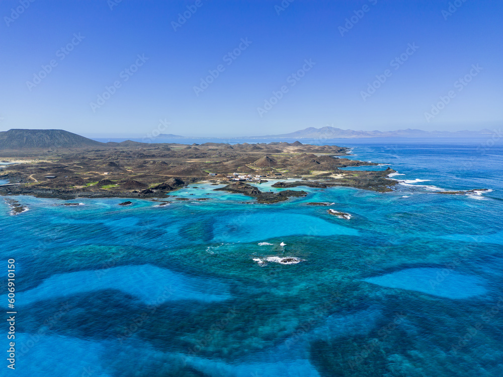 Aerial view of Puertito village and the beautiful natural pools  lagoons of the island of Lobos near Corralejo in Fuerteventura Spain