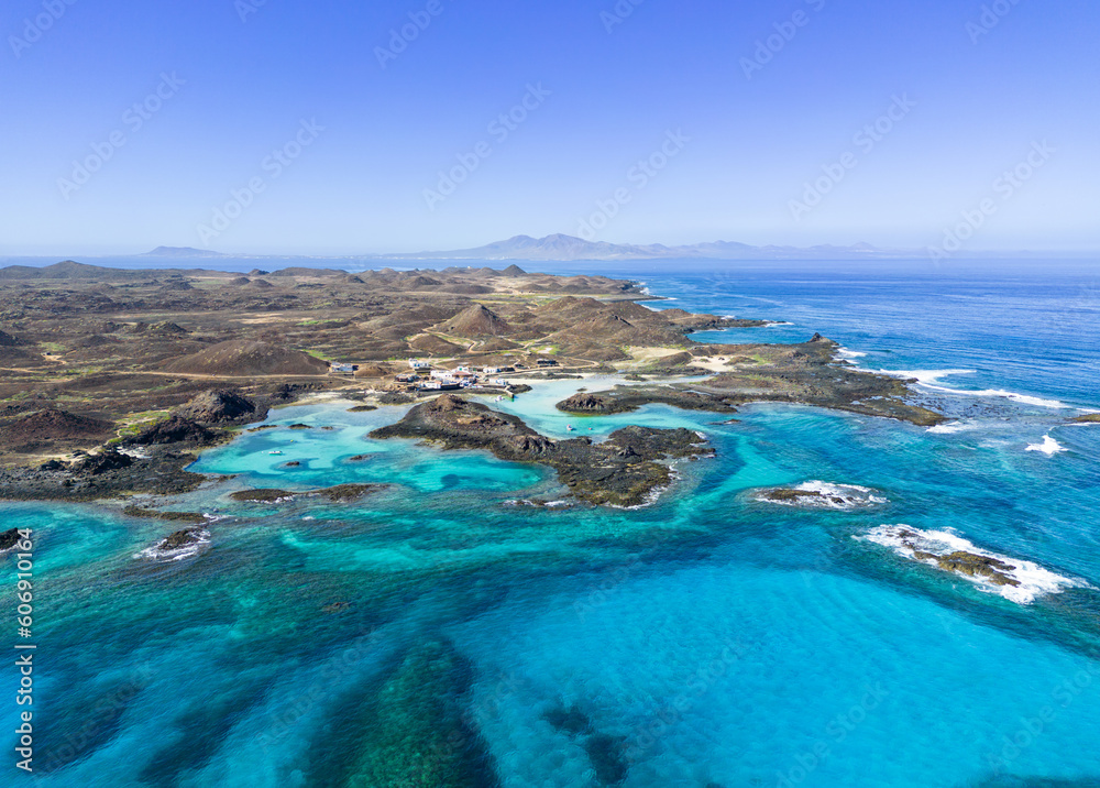 Aerial view of Puertito village and the beautiful natural pools  lagoons of the island of Lobos near Corralejo in Fuerteventura Spain