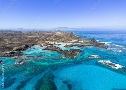 Aerial view of Puertito village and the beautiful natural pools  lagoons of the island of Lobos near Corralejo in Fuerteventura Spain