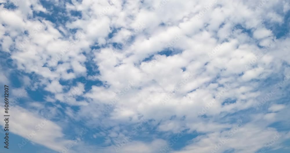 White beautiful cirrus-cumulus cloudscape spreading along the horizon. Summer skies with clouds from low angle perspective. Timelapse. White beautiful cirrus-cumulus cloudscape spreading along the horizon. Summer skies with clouds from low angle perspective. Timelapse.