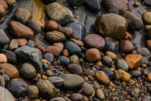 Colored pebbles and rocks on beach