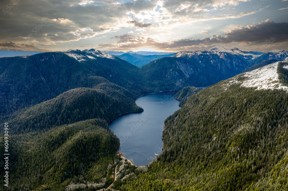 Majestic Fjord: Serene Alaskan Lake Embraced by Mountains