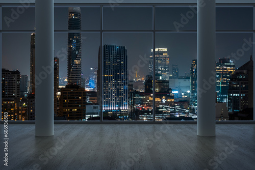 Empty room Interior Skyscrapers View Bangkok. Downtown City Skyline Buildings from High Rise Window. Beautiful Expensive Real Estate overlooking. Night time. 3d rendering. © VideoFlow