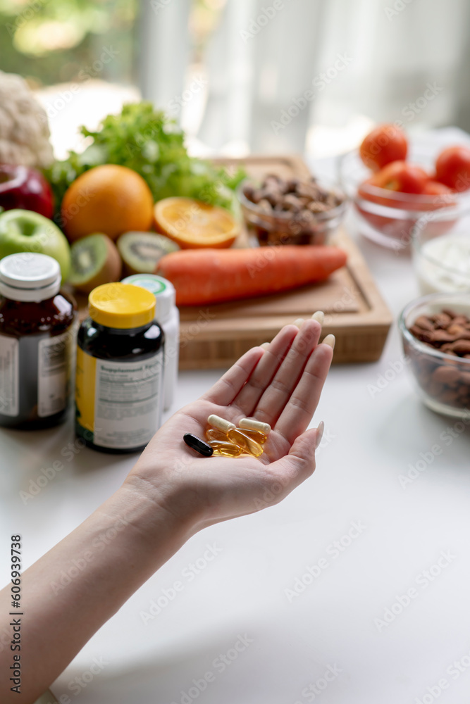 Ταπετσαρία Woman professional nutritionist checking dietary supplements in hand, surrounded
