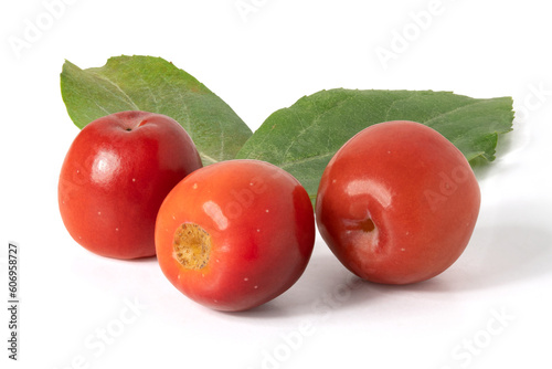 Close-up of a paradise apples berry with leaves on a white background. Full depth of field. With clipping path